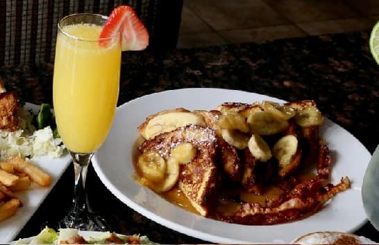 Breakfast French Toast with pure maple syrup and mimosa at Symposium Brantford
