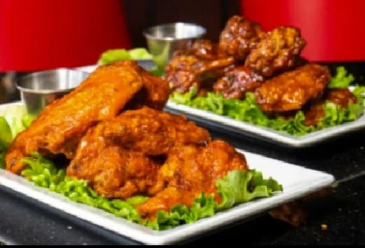 Appetizers Chicken Wings Special at Symposium Cambridge