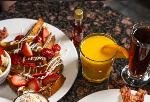 French Toast with strawberries and orange juice at Symposium Georgetown Ontario