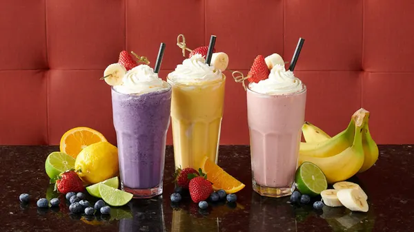 Creamy fresh fruit milkshakes from the Symposium Cafe dessert and specialty beverage menu.