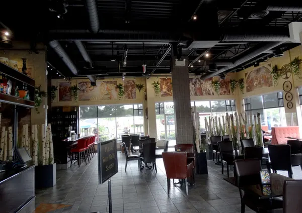 Markham dining room with comfortable seating, warm lighting and a polished family-friendly atmosphere.