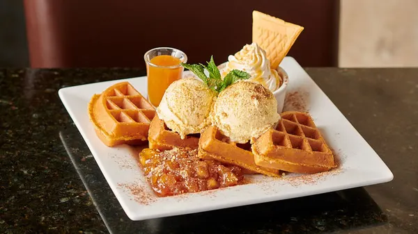 Milton dessert favourite with a hot Belgian waffle, creamy ice cream and rich dessert sauce.