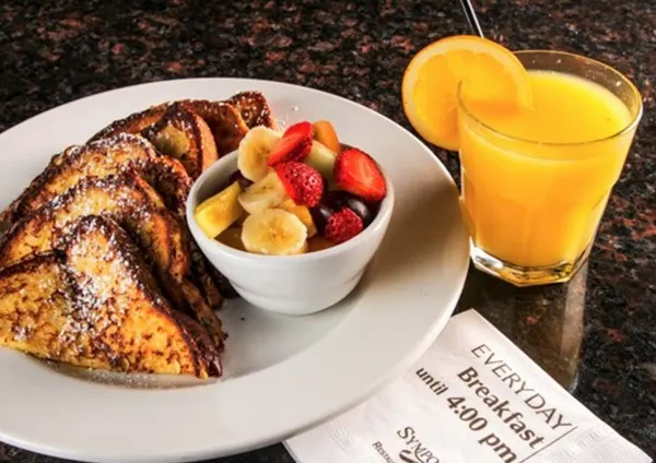 All-day breakfast in Ancaster with golden French toast, fresh fruit and chilled orange juice.