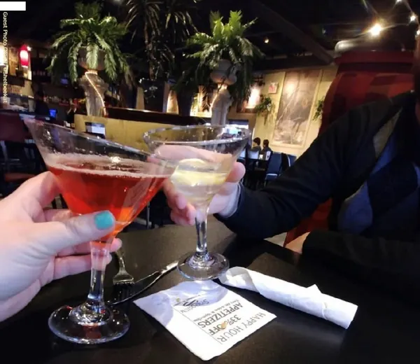 Happy-hour drinks and handcrafted cocktails served at Symposium Cafe Restaurants across Ontario.