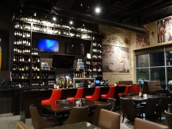 Lindsay bar and lounge with warm lighting, comfortable seating and a relaxed atmosphere.