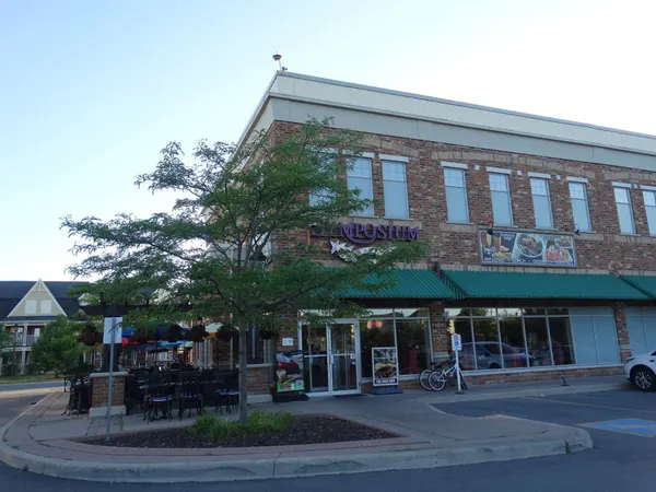 Ontario patio dining at Symposium Cafe with comfortable outdoor seating and full restaurant service.