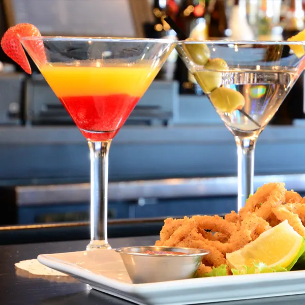 Martini cocktails with crispy calamari at Symposium Cafe Oakville bar and lounge