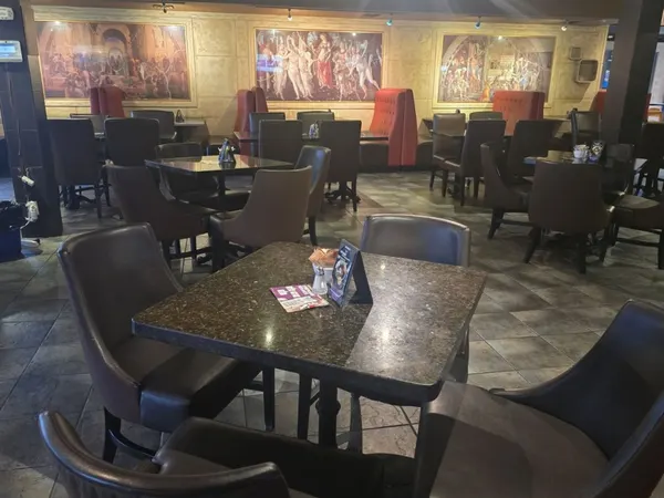 Thornhill group dining spot with spacious tables and comfortable seating at Symposium Restaurant