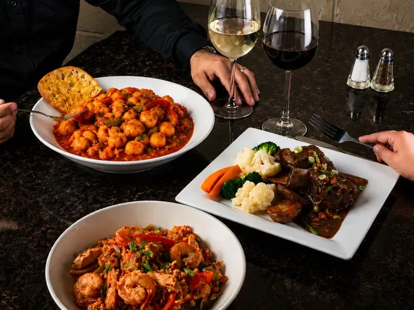 Dinner for Two Thursday special in Waterloo Ontario at Symposium Cafe Restaurant with delicious entrées and wine