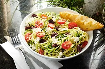 Symposium Cafe Restaurant vegetarian and gluten-friendly menu featuring freshly prepared plant-forward dishes.