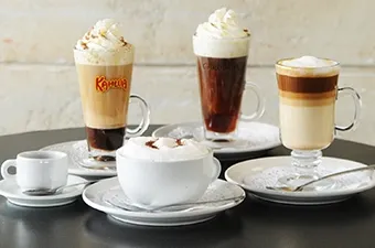 Symposium Cafe Restaurant specialty coffee and non-alcoholic drinks featuring lattes, juices, smoothies and milkshakes.