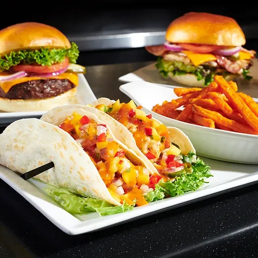 Symposium Cafe Restaurant lunch and dinner menu featuring burgers, pasta, salmon, ribs, wings and fresh salads.